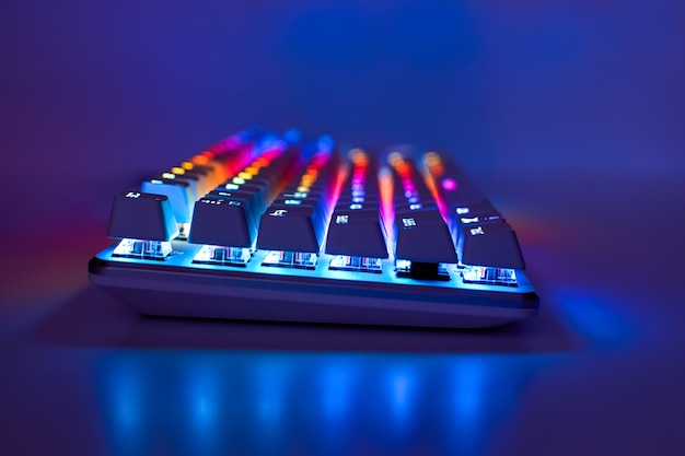 Gaming keyboard with RGB light, side view.