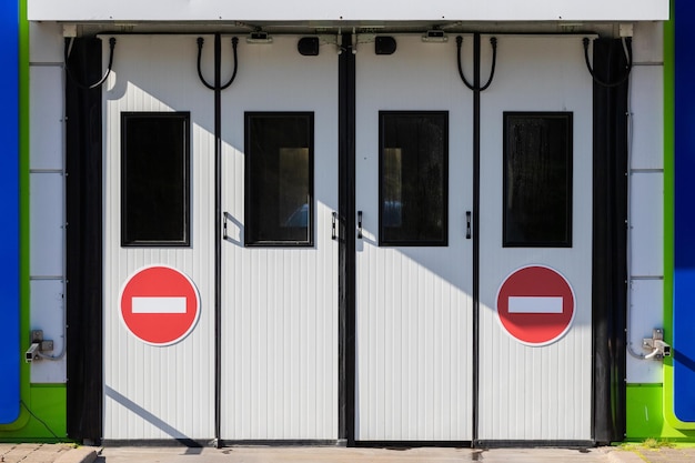 Garage doors with two traffic signs do not enter