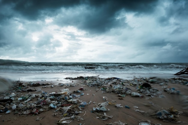 Garbage on beach environmental pollution in Bali Indonesia Storm is coming And drops of water are on camera lens