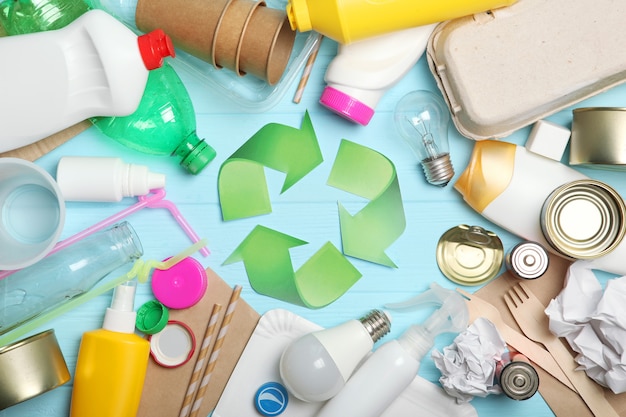 Garbage and recycling sign on a colored background top view