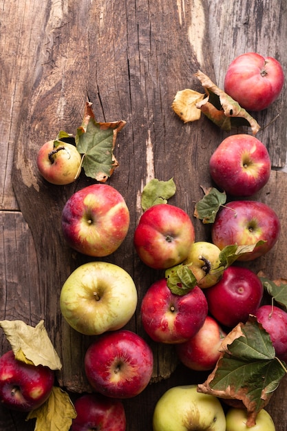 Garden apples on wooden boards autumn harvest