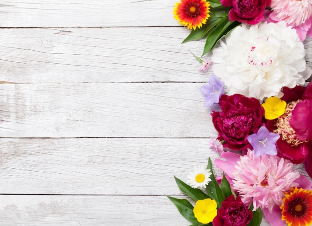 Garden flowers on wood