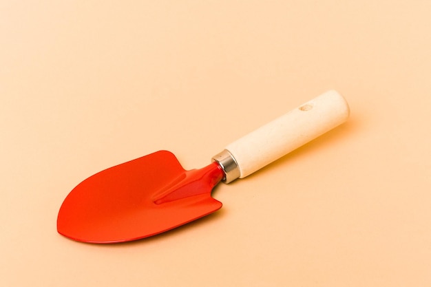 Garden tools isolated on beige background