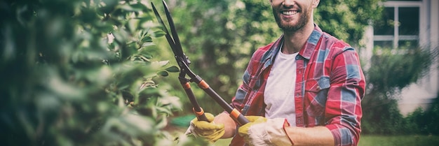 Gardener cutting plants