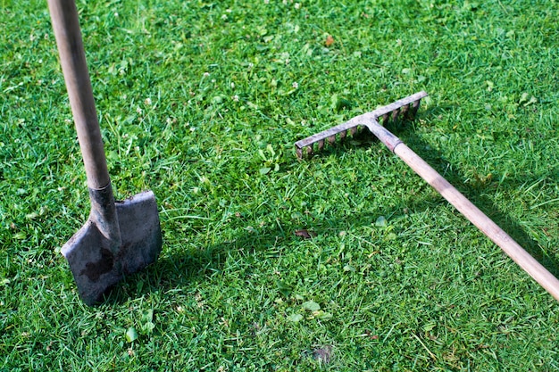 Gardening Tools. Agricultural concept. Farming season. Shovel and rake.