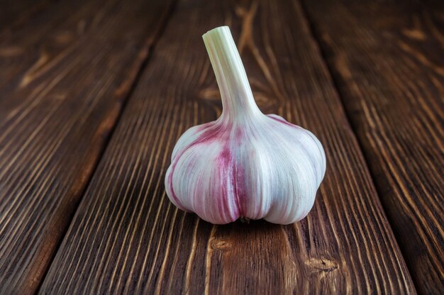 Garlic bulb on wooden table