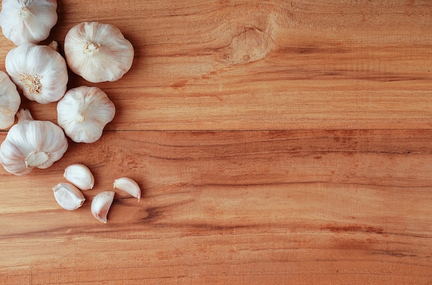 Garlic Cloves and Bulb on the wooden table