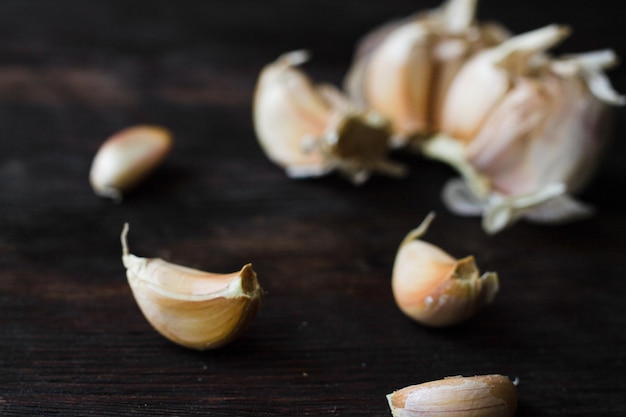 Garlic cloves on a wooden table