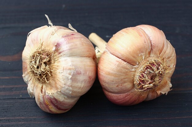 Garlic on a dark background close up