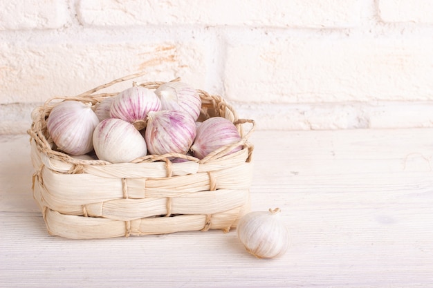 Garlic heads in a wicker basket