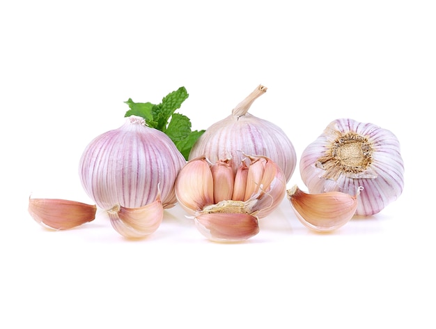 Garlic isolated with mint leaf isolate on white