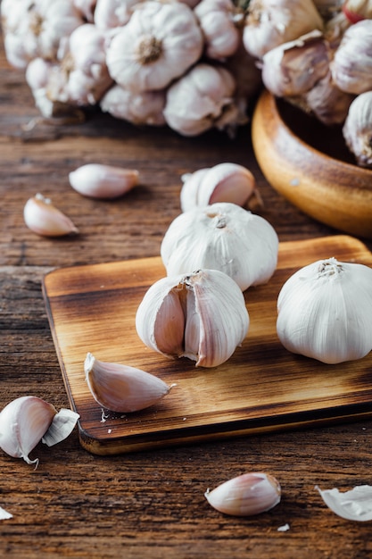 garlic on old wooden table background