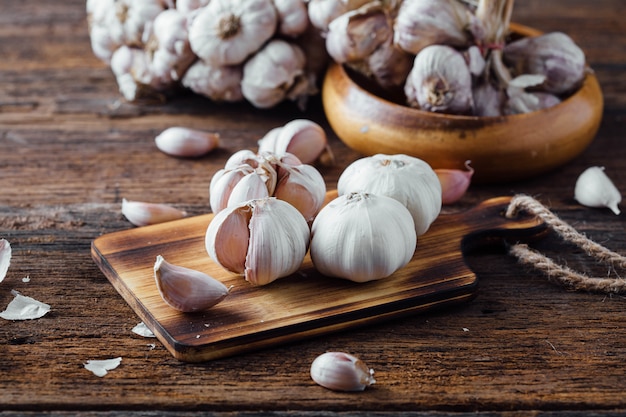 garlic on old wooden table background