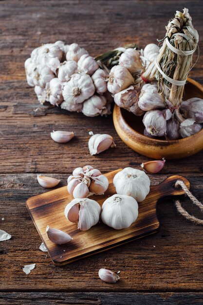 garlic on old wooden table background