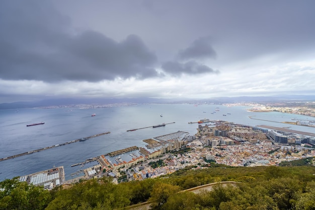 Garn panoramic view of the bay of Gibraltar with the city by the sea and boats sailing the sea