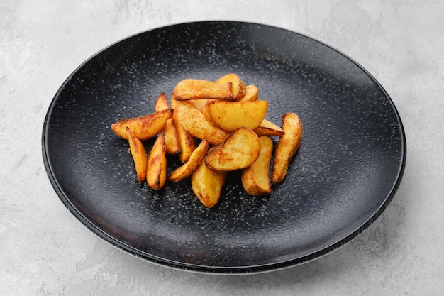 Garnish to the main dish Slices of potato wedges fried in oil