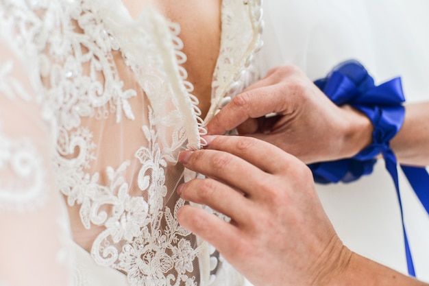 Garter on the leg of a bride, Wedding day moments