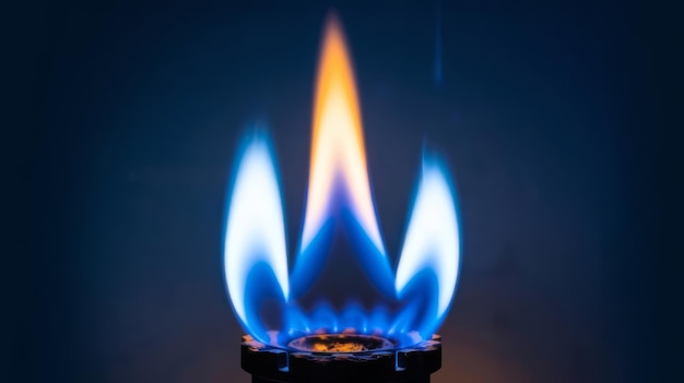 Photo gas burner with blue burnig methane flame on dark background