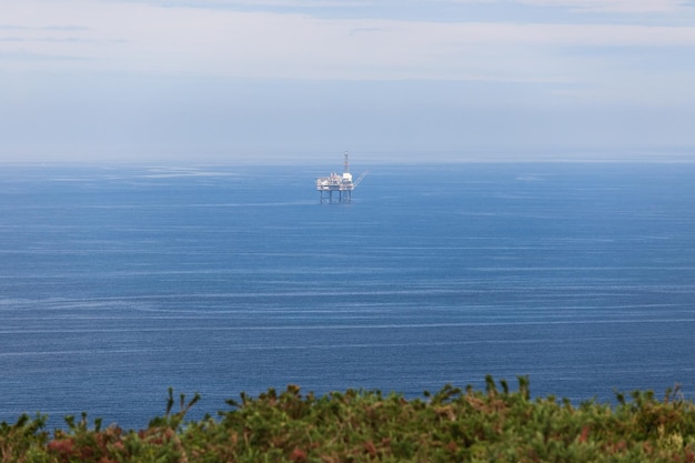 Gas platform which emerges from turquoise blue Cantabrian Sea Cape Matxitxako Biscay Basque Country