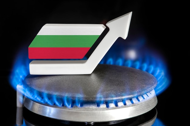 Gas price Rise in gas prices in Bulgaria A burner with a flame and an arrow up painted in the colors of the Bulgaria flag The concept of rising gas or energy prices