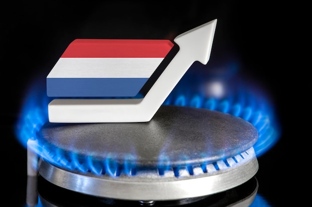 Gas price Rise in gas prices in Netherlands A burner with a flame and an arrow up painted in the colors of the Netherlands flag The concept of rising gas or energy prices