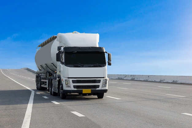 Gas Truck on highway road with tank oil. 