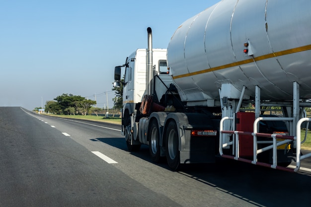 Gas Truck on highway road with tank