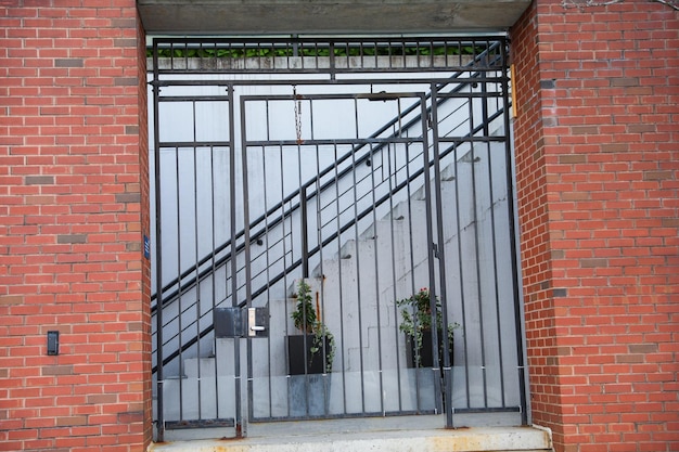 A gate with a sign that says's the word'on it