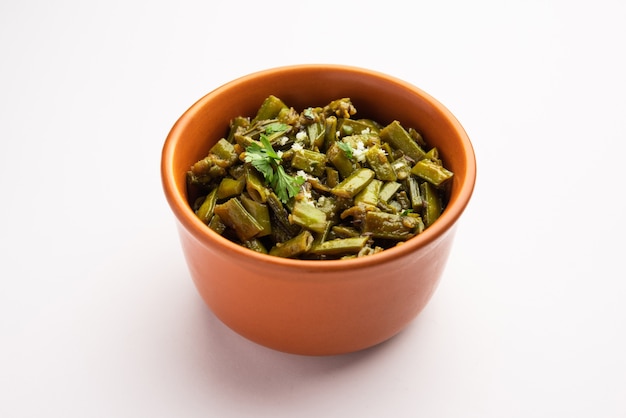 Gavarfali or gawar or Gavar sabzi recipe made using cluster beans in gravy or dry fry