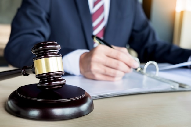 gavel and soundblock fo justice law and lawyer working on wooden desk background