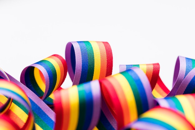 Gay pride LGBT rainbow ribbon on white background