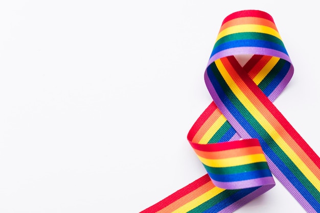 Gay pride LGBT rainbow ribbon on white background