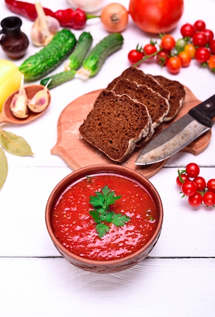 Gazpacho spanish cold soup in a round ceramic plate