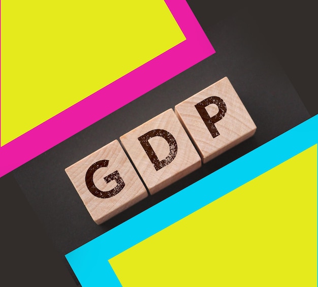 GDP Gross Domestic Product concept cube wooden block with alphabet combine abbreviation GDP measure growth of country economic product and service