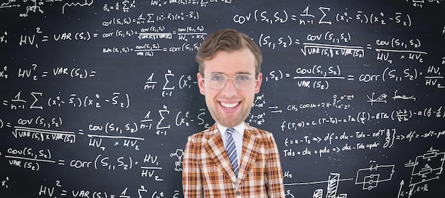 Geeky businessman  against blackboard