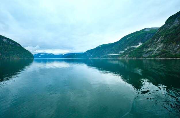 Geiranger Fjord (Norge) evening cloudy summer view