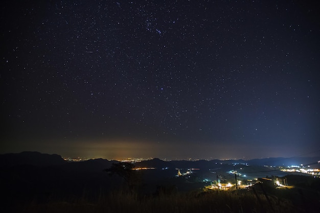 Geminid Meteor in the night sky over Wat Phra That Pha Son Kaew temple Phetchabun Thailand