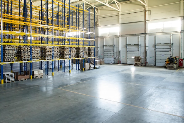 General view to the loading gates inside the warehouseInterior of a modern warehouse storage Truck loading processxA