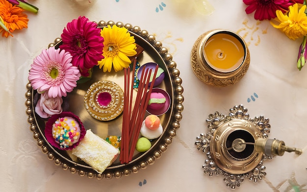 Photo generativeai topdown bhai dooj pooja setup featuring thali sweets and festive elements