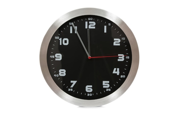 Generic black and silver wall clock showing at the eleventh hour on a white background