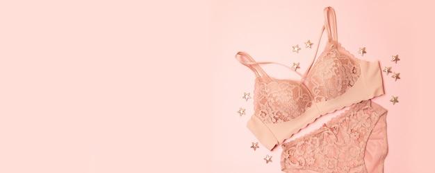 Gently pink lace underwear with stars decor on pink