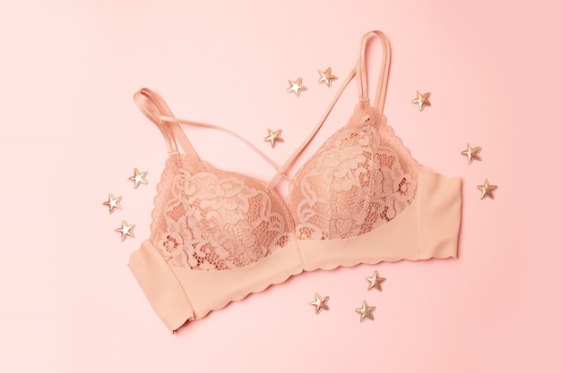 Gently pink lace underwear with stars decor on pink 