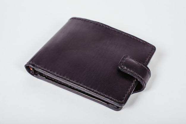 genuine leather wallet brown color on isolated white background.