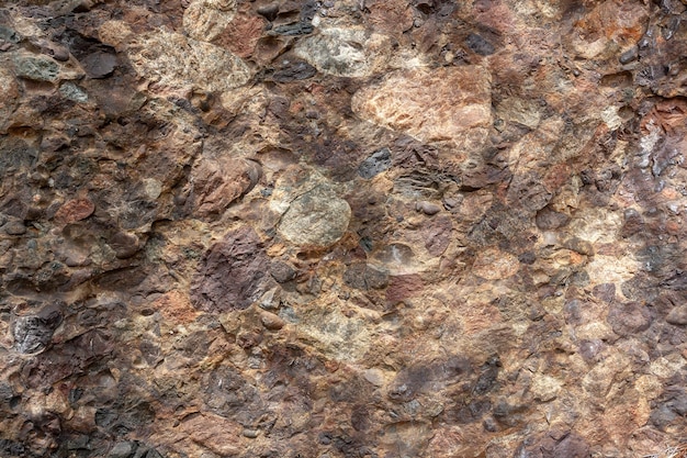 Geological section of rocky slab consisting of different stones Horizontal