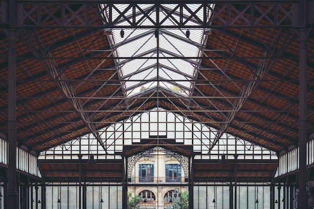 Geometric wrought iron ceiling of the old Born Market in Barcelona