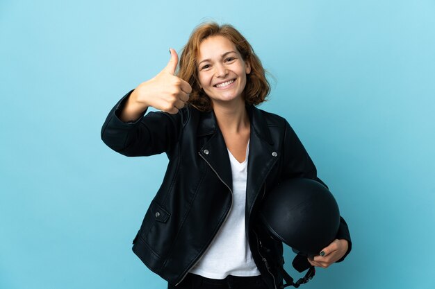 Georgian girl holding a motorcycle helmet isolated