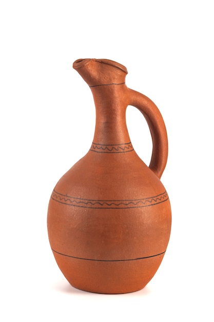 Georgian handmade ceramic jug, named Doqi, for wine and water on white background.