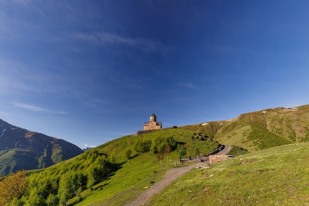 Gergeti Trinity Church near the village Stepantsminda in Georgia ,At an altitude of 2170 meters, und