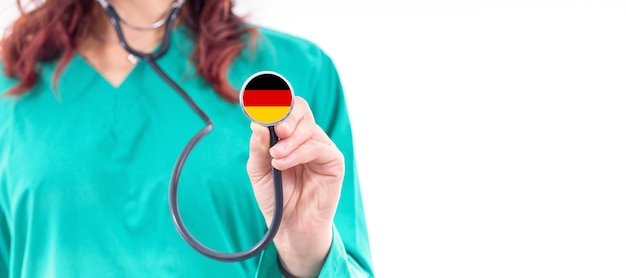 Germany national healthcare system female doctor with stethoscope