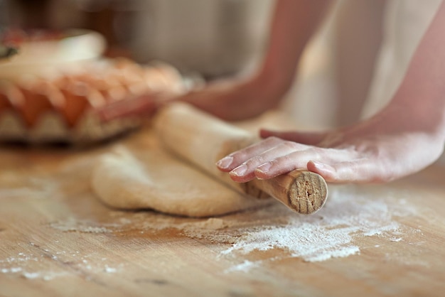 Get rolling Cropped shot of a set of hands rolling out dough